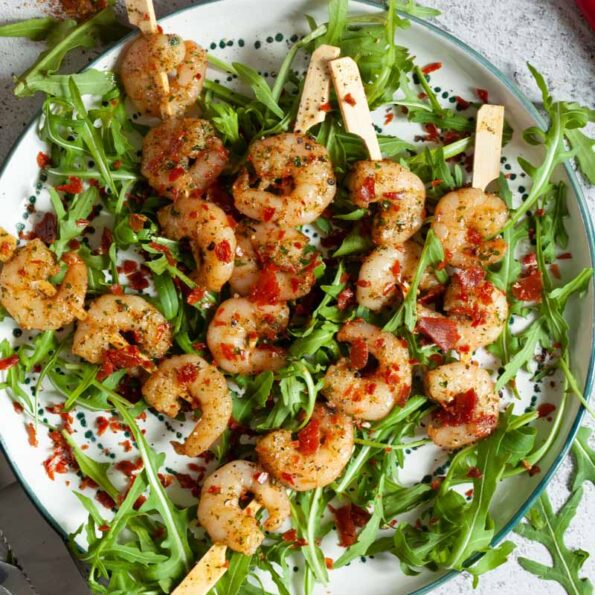 Prawns with harissa and Prosciutto