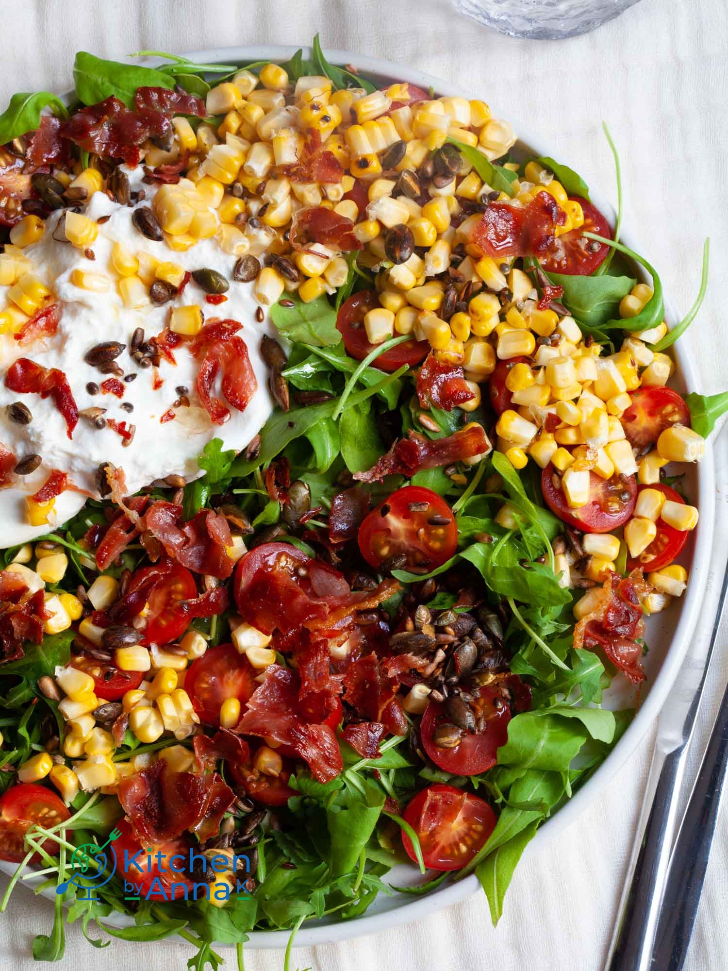 Burrata tomato corn salad with serrano ham