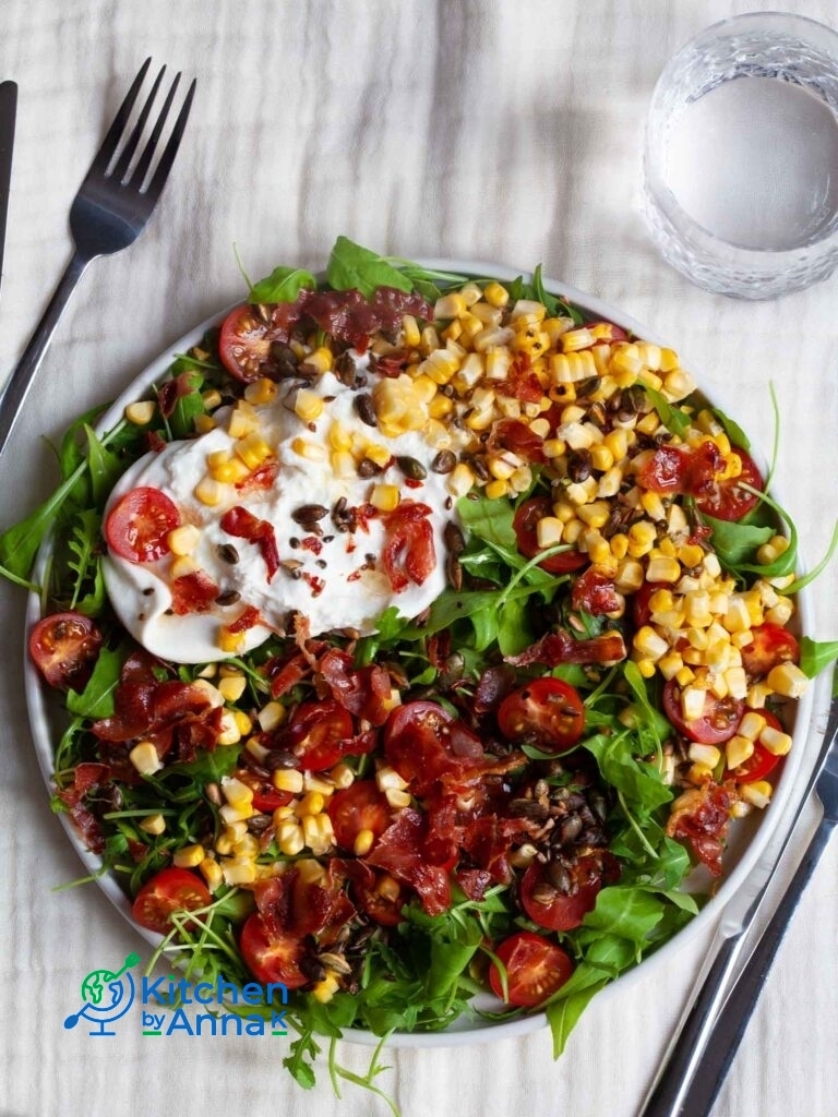 Burrata tomato corn salad with serrano ham