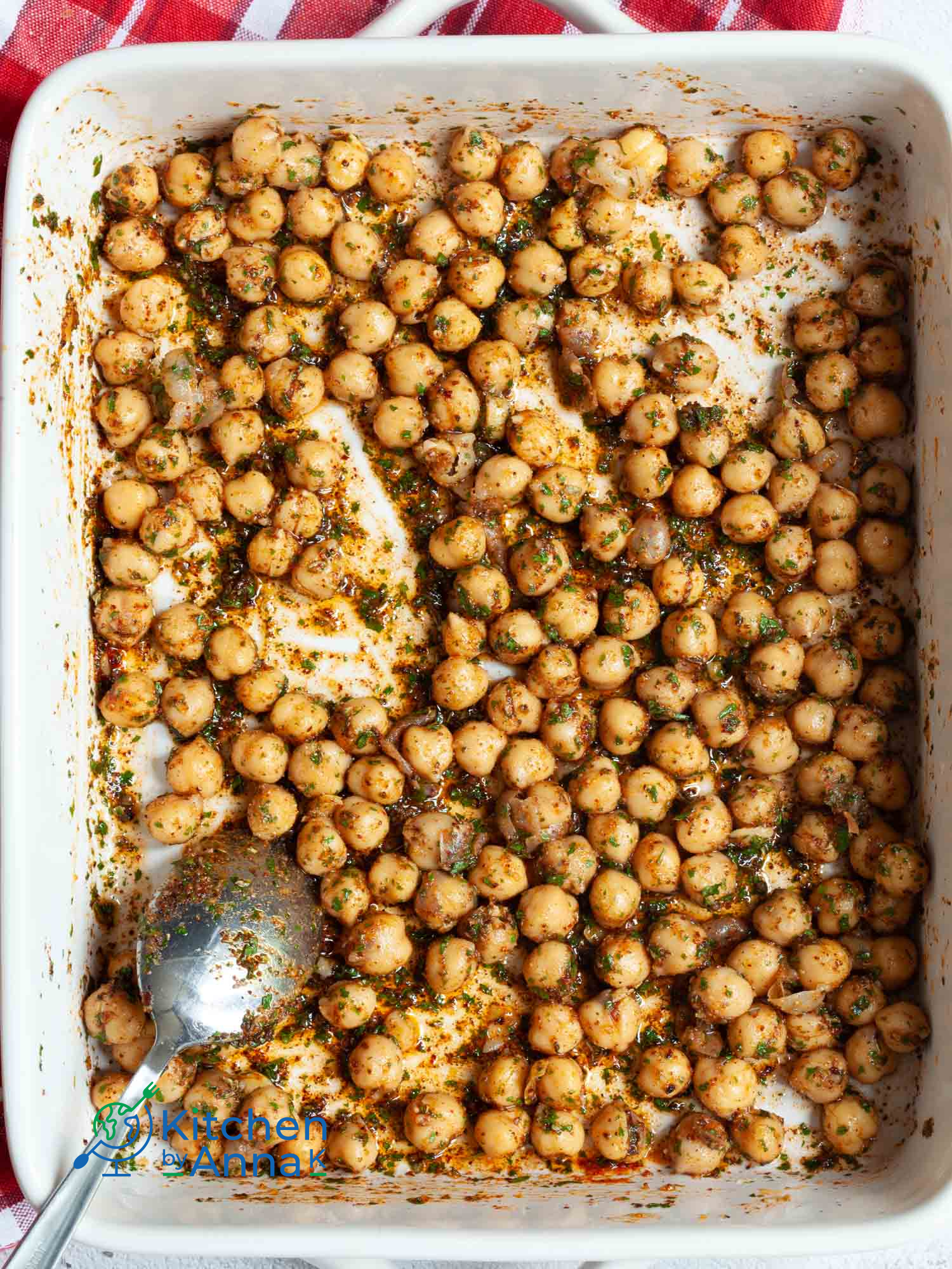 Sriracha and tomato baked chicken drumsticks with Mediterranean chickpeas