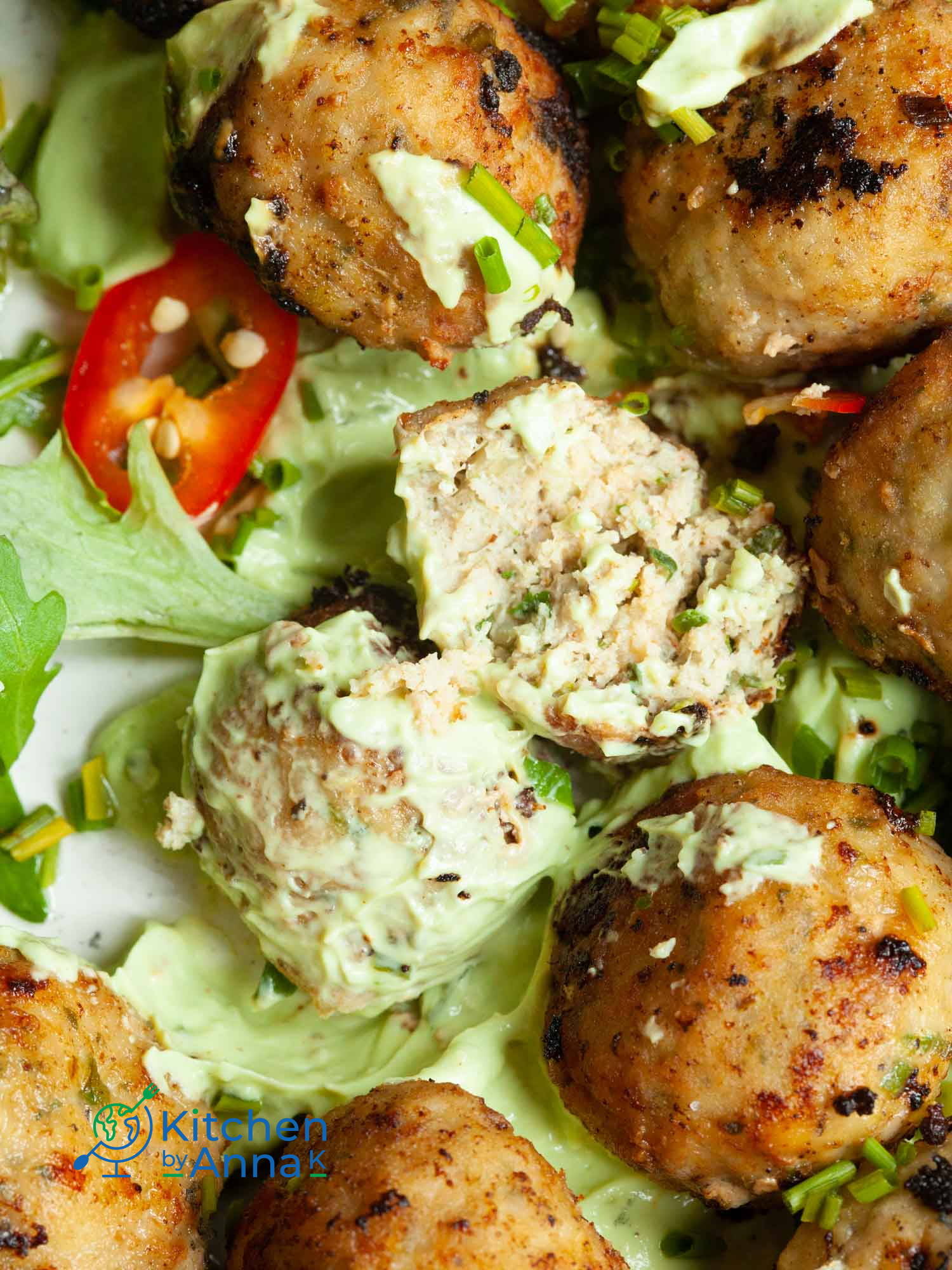 Pork meatballs with green onions and avocado yoghurt dip