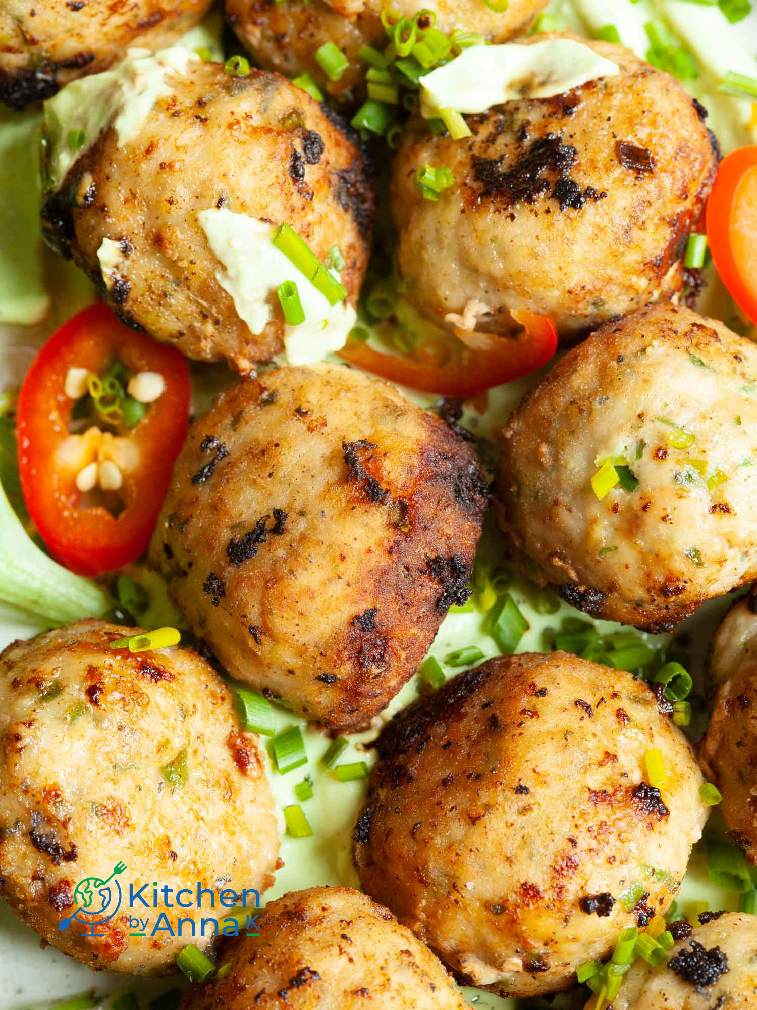 Pork meatballs with green onions and avocado yoghurt dip